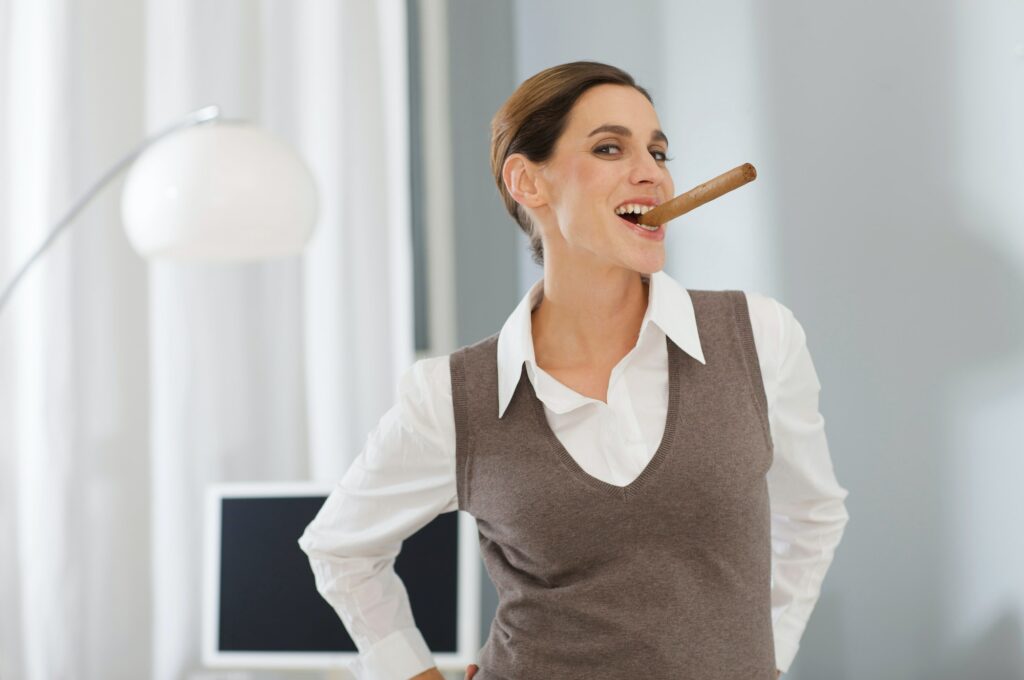 cigar smoking business woman